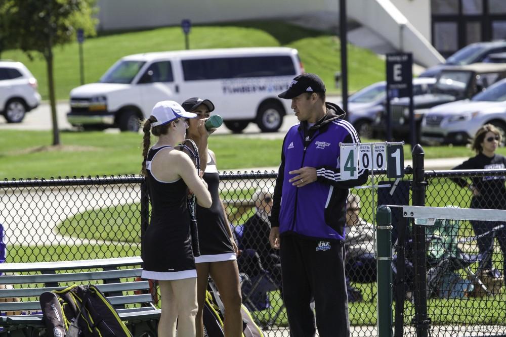 GVL / Sara Carte
Grand Valley’s Women’s Tennis coach, John Black, coaches his players between matches against Northwood University on Sunday, September 13, 2015.