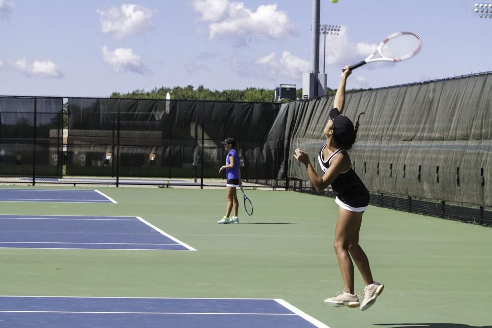 GVL / Sara Carte
GRand Valley’s Women’s Tennis player, Aimee Moccia, serves against Northwood University on Sunday, September 13, 2015.