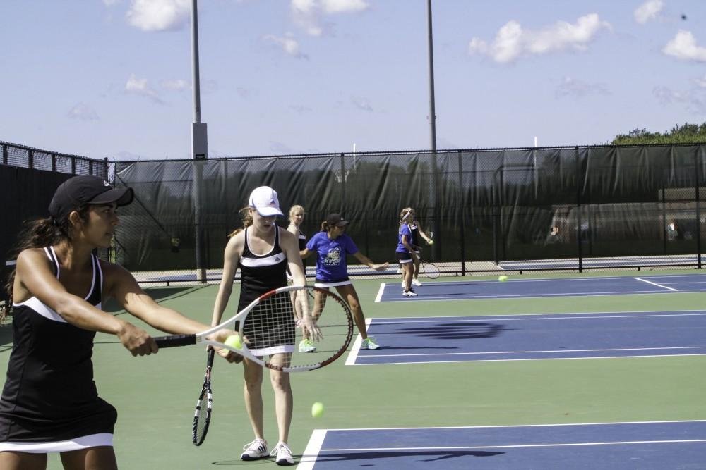 GVL/ Sara Carte
Grand Valley’s Women’s Tennis team gets ready to go against Northwood UNiversity on Sunday, September 13, 2015.