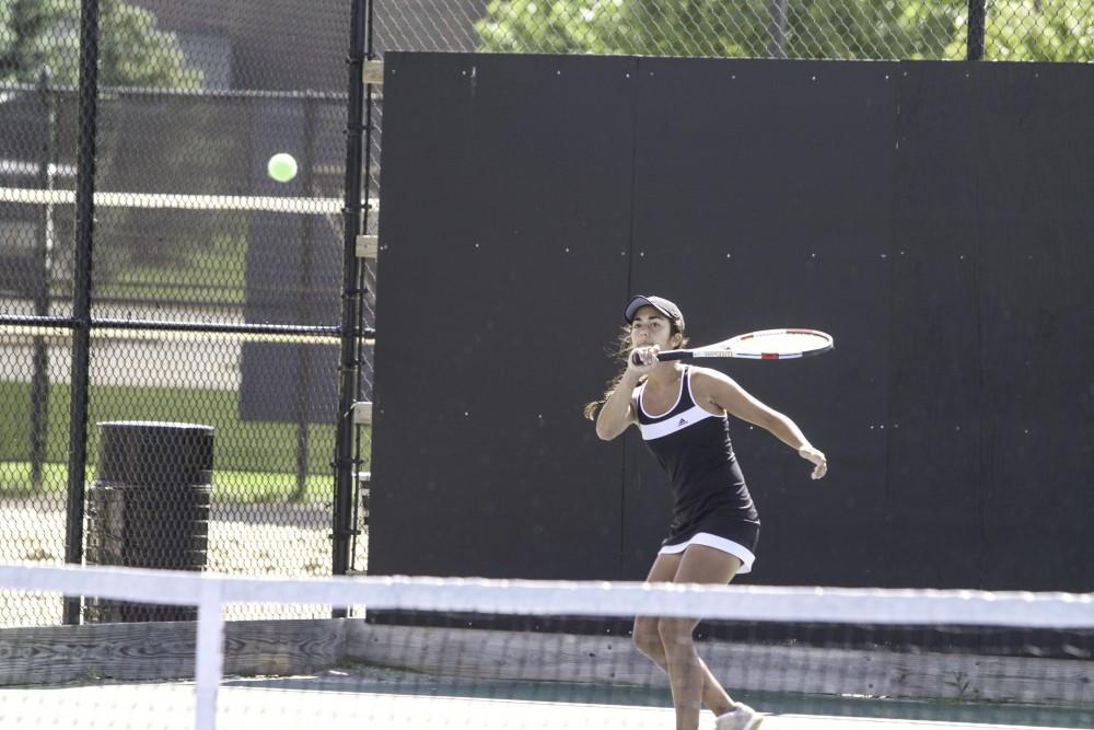 GVL / Sara Carte
GRand Valley’s Women’s Tennis player. Aimee Moccia, swings against Northwood University on Sunday, September 13, 2015.