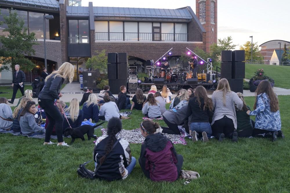GVL/Lauren Loria
GVSU students enjoy the musical preformane at Rock Against Rape on Friday September 11th. 