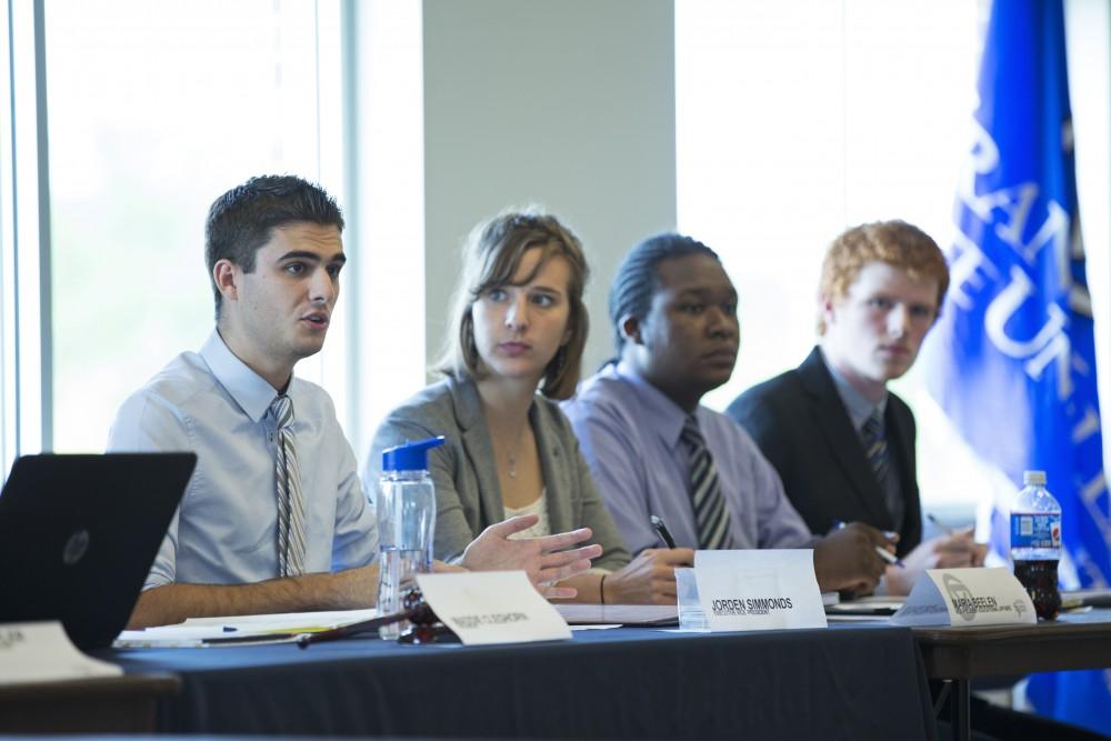 GVL / Kevin Sielaff    
Jorden Simmons speaks to the senators. The Student Senate convenes Sept. 3 inside the Kirkhoff Center at Grand Valley's Allendale campus. 