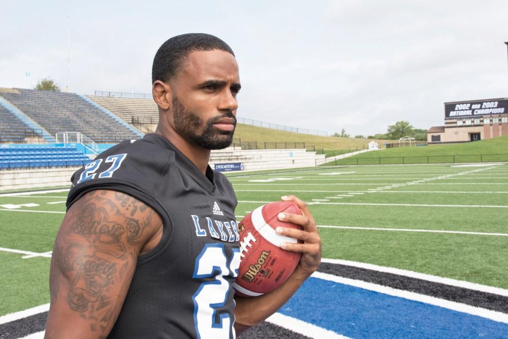 GVL / Kevin Sielaff
The Grand Valley State University football squad gathers for its annual media day Wednesday, August 19th, 2015. The afternoon aimed to promote the highly anticipated 2015 football season, while also making predictions for what the year ahead might hold.  Senior running back Kirk Spencer (27) poses for his final media day photos.   