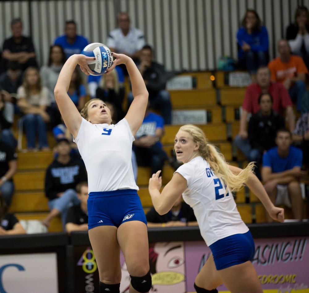 GVL / Kevin Sielaff     Katie Olson (9) sets the ball. The Laker Vollyeball team squares off against SVSU Sept. 19 inside the Fieldhouse Arena in Allendale. The Lakers defeated SVSU by a margin of 3-1.