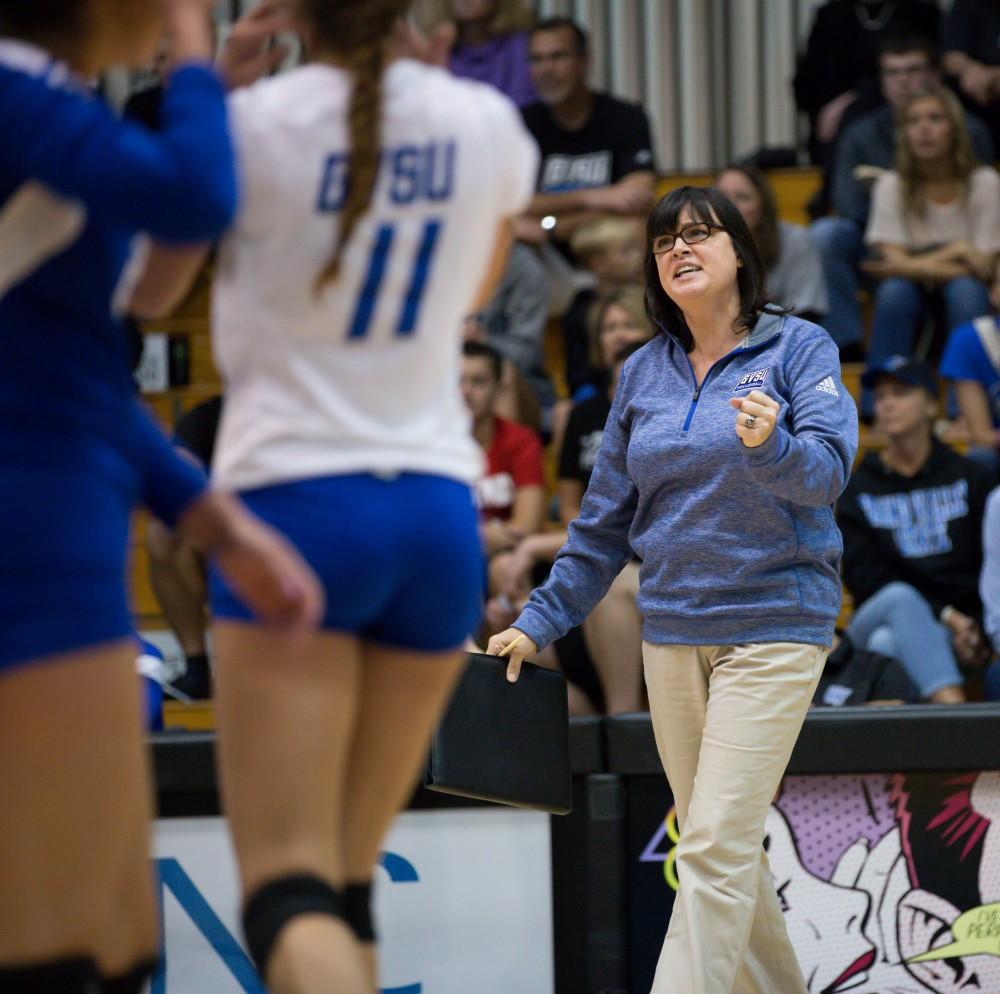 GVL / Kevin Sielaff     Head coach Deanne Scanlon, upset over a call, speaks to the refs. The Laker Vollyeball team squares off against SVSU Sept. 19 inside the Fieldhouse Arena in Allendale. The Lakers defeated SVSU by a margin of 3-1.