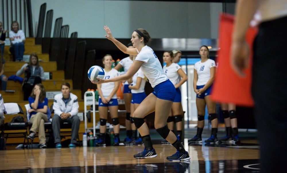 GVL / Kevin Sielaff     Betsy Rhonda (6) serves the ball. The Laker Vollyeball team squares off against SVSU Sept. 19 inside the Fieldhouse Arena in Allendale. The Lakers defeated SVSU by a margin of 3-1.