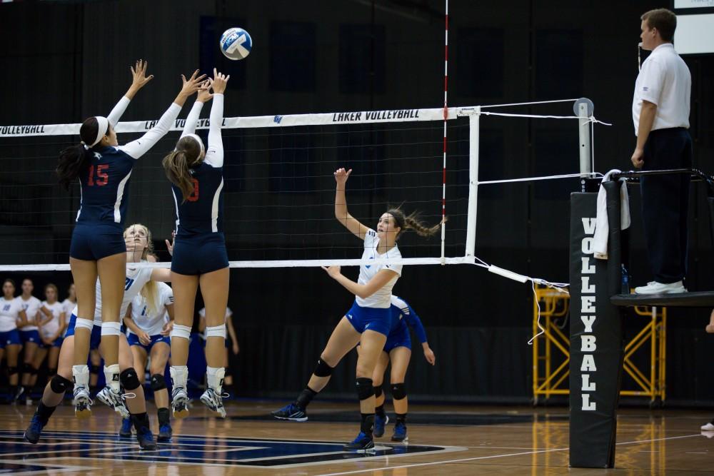 GVL / Kevin Sielaff     Betsy Rhonda (6) hits the ball over the net. The Laker Vollyeball team squares off against SVSU Sept. 19 inside the Fieldhouse Arena in Allendale. The Lakers defeated SVSU by a margin of 3-1.