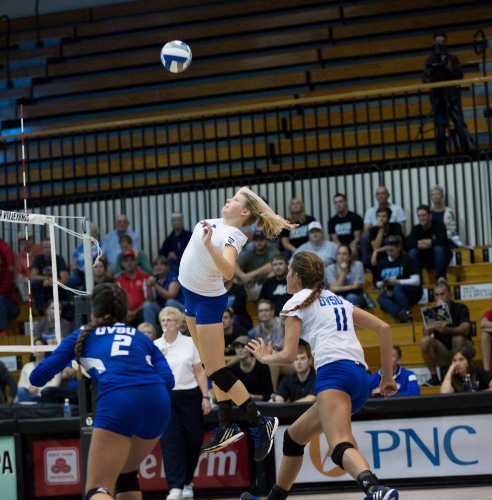 GVL / Kevin Sielaff     Jessica Majerle (3) jumps for a kill. The Laker Vollyeball team squares off against SVSU Sept. 19 inside the Fieldhouse Arena in Allendale. The Lakers defeated SVSU by a margin of 3-1.