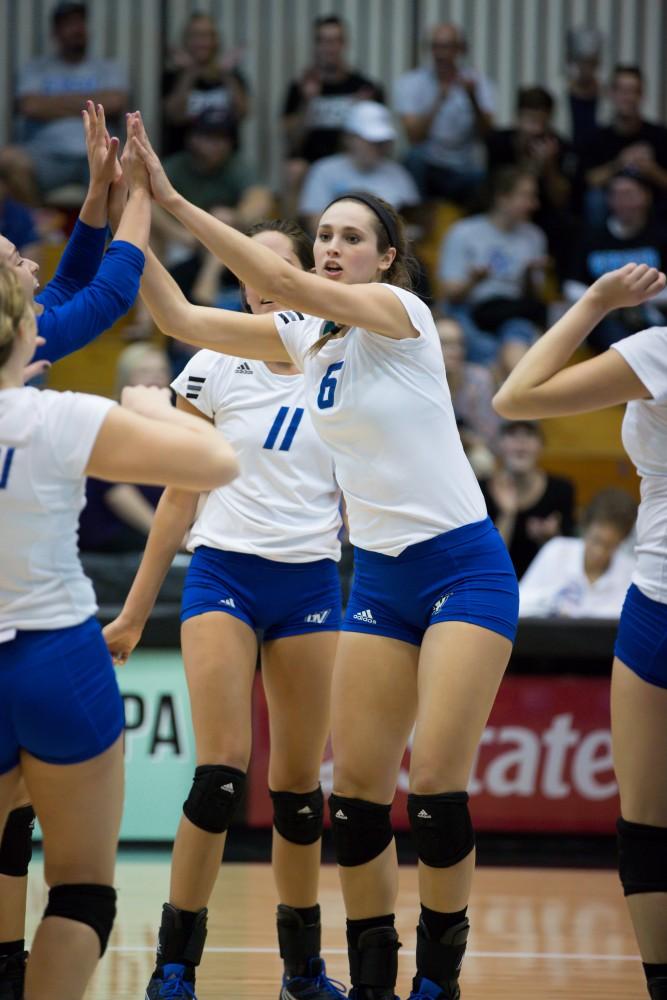 GVL / Kevin Sielaff     Betsy Rhonda (6) congratulates her teammates. The Laker Vollyeball team squares off against SVSU Sept. 19 inside the Fieldhouse Arena in Allendale. The Lakers defeated SVSU by a margin of 3-1.