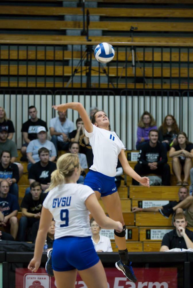 GVL / Kevin Sielaff     Kourtney Wolters (11) looks to spike the ball. The Laker Vollyeball team squares off against SVSU Sept. 19 inside the Fieldhouse Arena in Allendale. The Lakers defeated SVSU by a margin of 3-1.