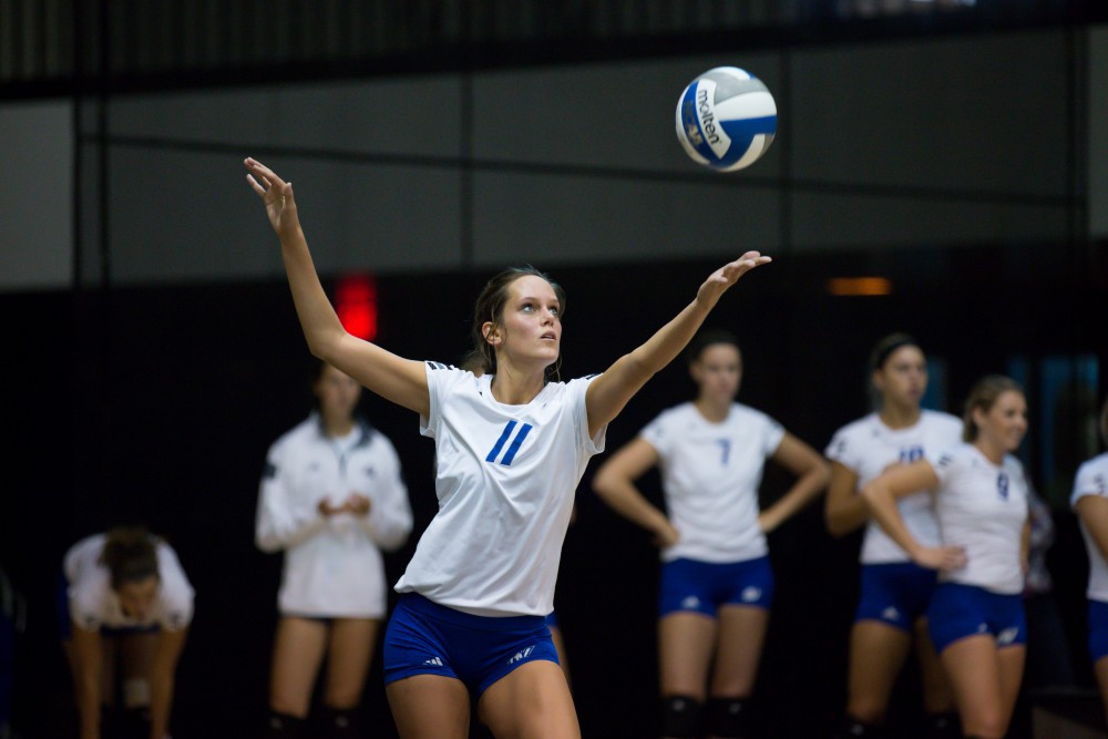 GVL / Kevin Sielaff     Kourtney Wolters (11) serves the ball. The Laker Vollyeball team squares off against SVSU Sept. 19 inside the Fieldhouse Arena in Allendale. The Lakers defeated SVSU by a margin of 3-1.