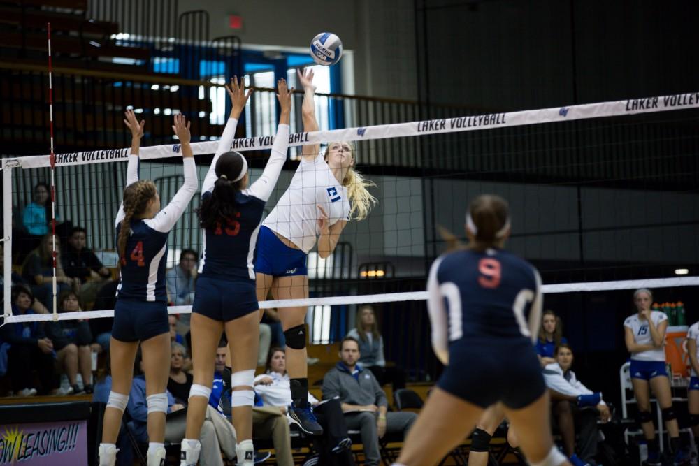 GVL / Kevin Sielaff     Staci Brower (21) looks to spike the ball. The Laker Vollyeball team squares off against SVSU Sept. 19 inside the Fieldhouse Arena in Allendale. The Lakers defeated SVSU by a margin of 3-1.