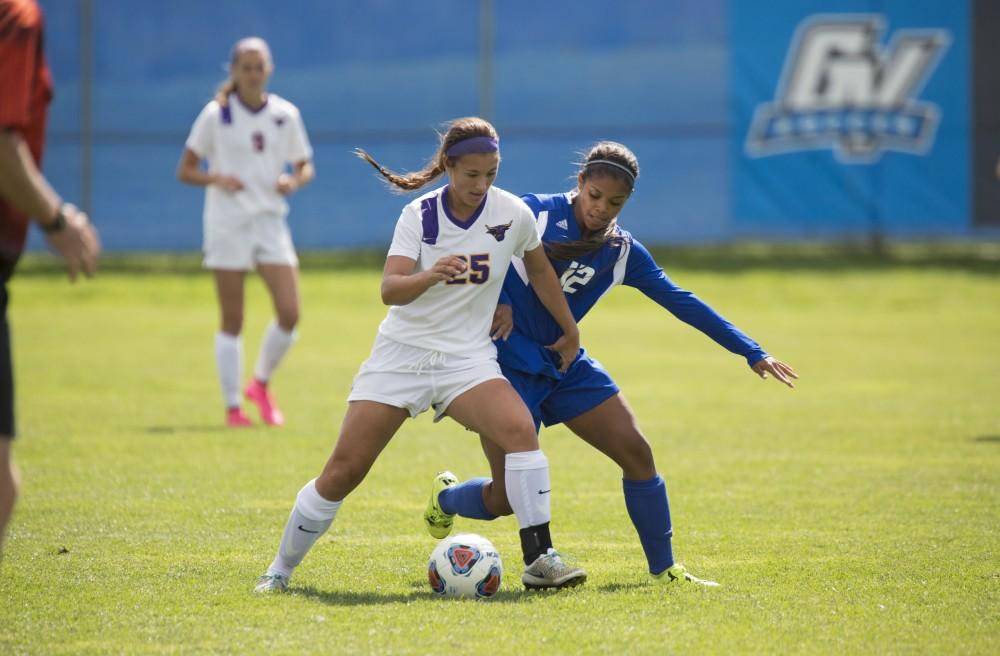 GVL/Kevin Sielaff
Lexi Pszanka of Minnesota State battles with Jayma Martin of Grand Valley. Grand Valley's women's soccer team defeats #4 ranked Minnesota State by a score of 2-1 Sept. 13. 