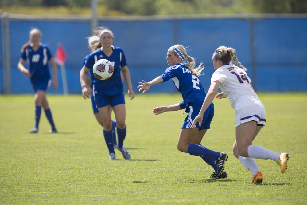 GVL/Kevin Sielaff
Katie Klunder moves around an opposing defender. Grand Valley's women's soccer team defeats #4 ranked Minnesota State by a score of 2-1 Sept. 13. 