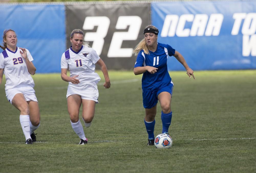 GVL/Kevin Sielaff
Sara Stevens dribbles through the Minnesota defense. Grand Valley's women's soccer team defeats #4 ranked Minnesota State by a score of 2-1 Sept. 13. 