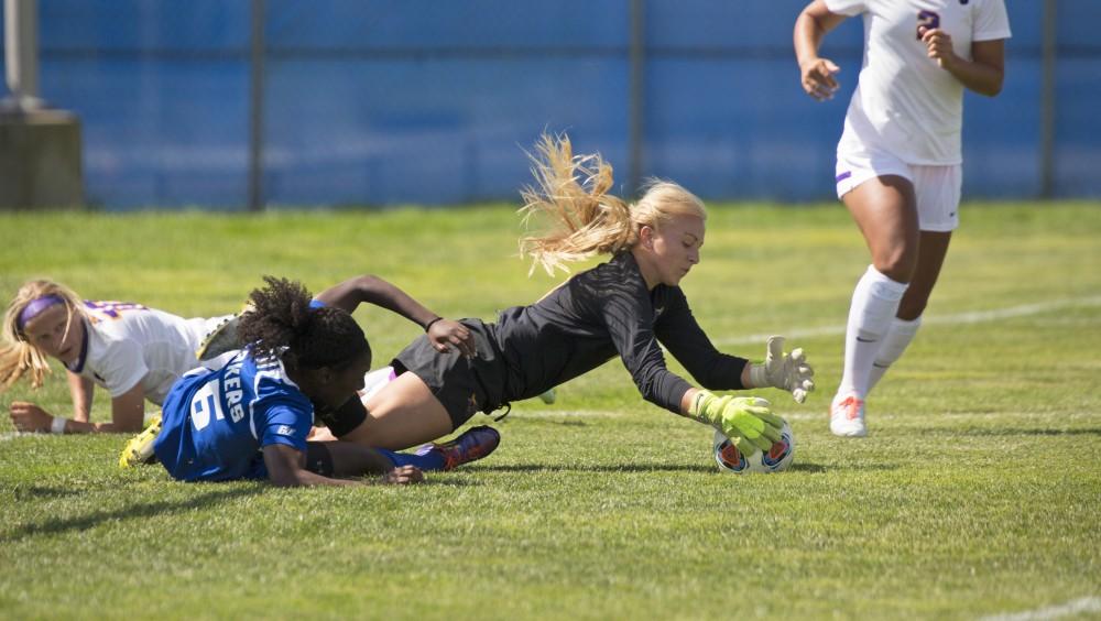 GVL/Kevin Sielaff
Goalkeeper Lauren Hoeppner saves a shot from Katie Bounds. Grand Valley's women's soccer team defeats #4 ranked Minnesota State by a score of 2-1 Sept. 13. 