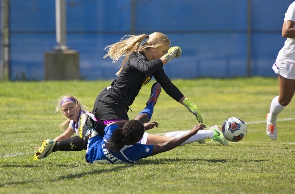 GVL/Kevin Sielaff
Goalkeeper Lauren Hoeppner saves a shot from Katie Bounds. Grand Valley's women's soccer team defeats #4 ranked Minnesota State by a score of 2-1 Sept. 13.