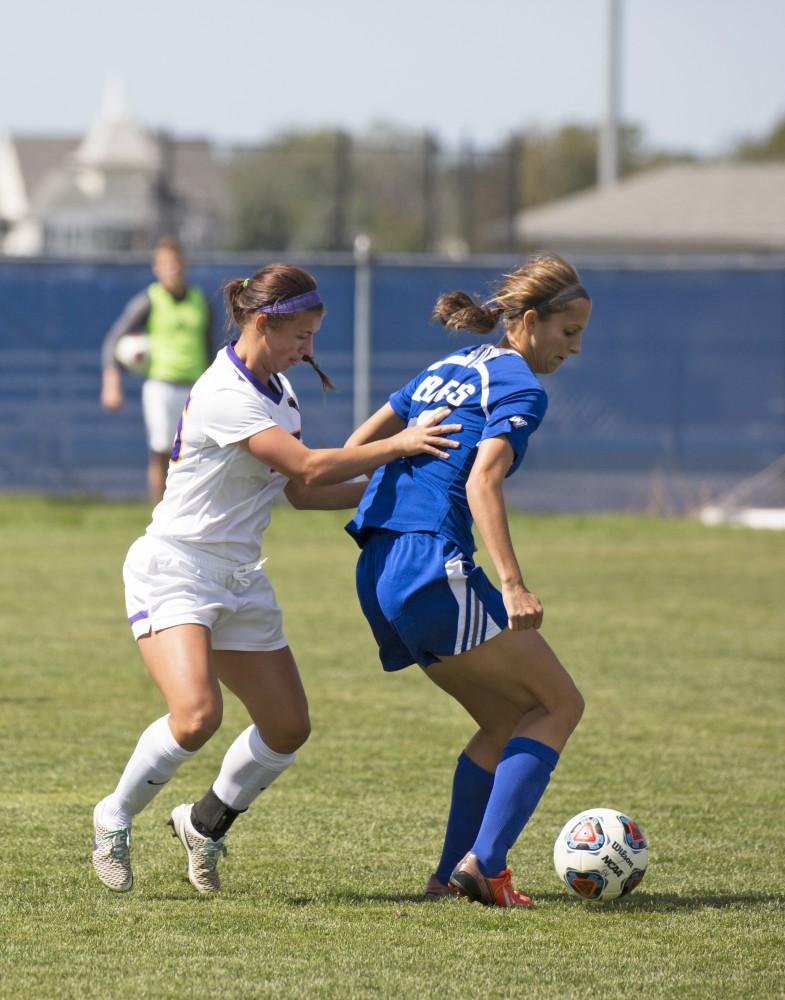 GVL/Kevin Sielaff
Gabriella Mencotti moves the ball away from a Minnesota State player. Grand Valley's women's soccer team defeats #4 ranked Minnesota State by a score of 2-1 Sept. 13. 