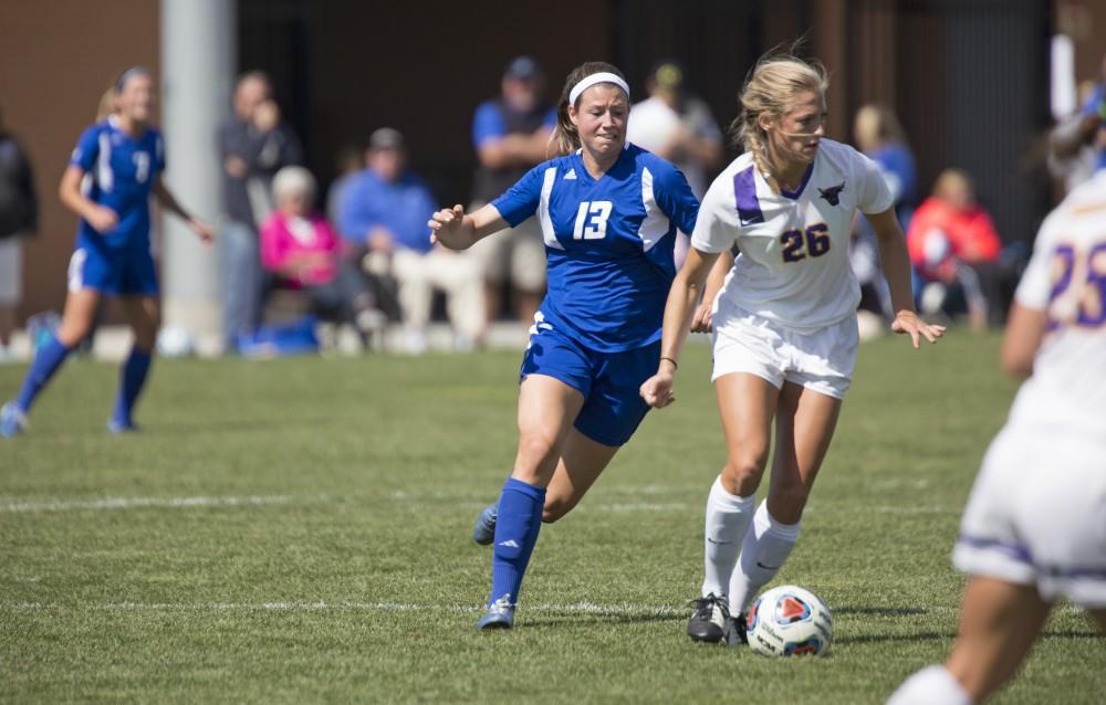 GVL/Kevin Sielaff
Marty Corbi sneaks behind a Minnesota State attacker. Grand Valley's women's soccer team defeats #4 ranked Minnesota State by a score of 2-1 Sept. 13. 