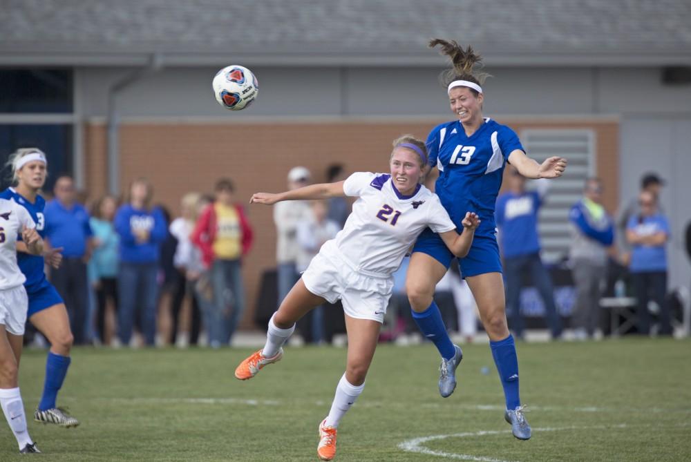 GVL/Kevin Sielaff
Marty Corbi heads the ball. Grand Valley's women's soccer team defeats #4 ranked Minnesota State by a score of 2-1 Sept. 13. 