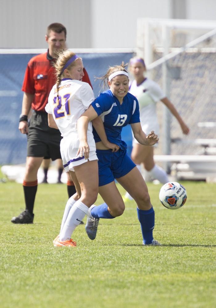 GVL/Kevin Sielaff
Marty Corbi fights through the Minnesota defense. Grand Valley's women's soccer team defeats #4 ranked Minnesota State by a score of 2-1 Sept. 13. 