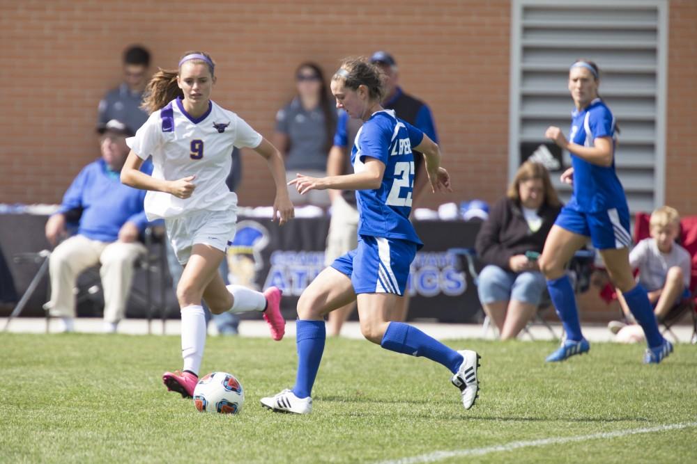 GVL/Kevin Sielaff
Katy Woolley pushes through the Minnesota defense. Grand Valley's women's soccer team defeats #4 ranked Minnesota State by a score of 2-1 Sept. 13. 