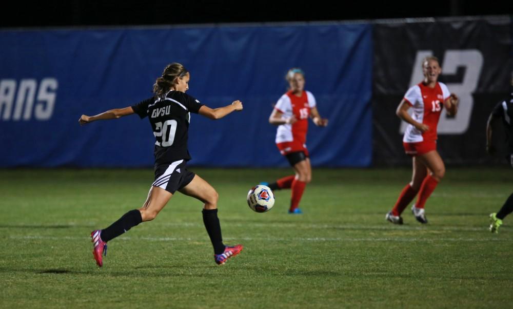 GVL/Kevin Sielaff  
Gabriella Mencotti (20) moves the ball toward the net. The Laker soccer team defeats SVSU Sept. 22 by a margin of 6-1 in Allendale.  