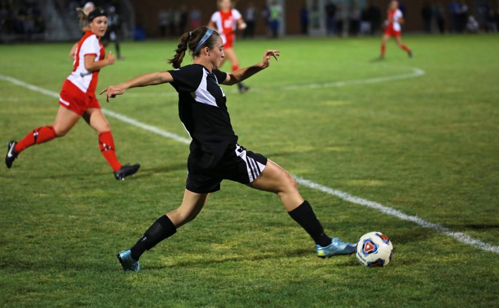 GVL/Kevin Sielaff  
Lindsay Ebeling (26) takes the ball toward Saginaw's net. The Laker soccer team defeats SVSU Sept. 22 by a margin of 6-1 in Allendale.  