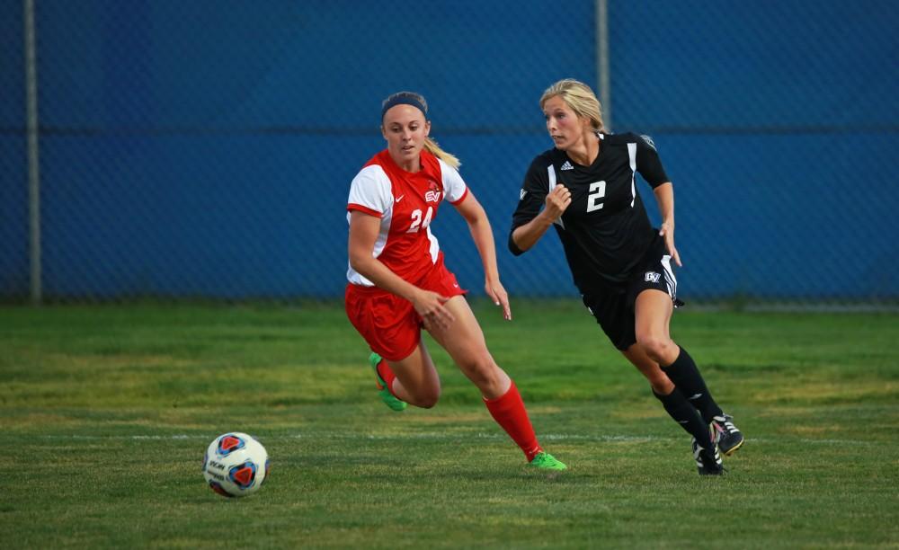 GVL/Kevin Sielaff  
Katie Klunder (2) evades SVSU defender Maddison Smith (24). The Laker soccer team defeats SVSU Sept. 22 by a margin of 6-1 in Allendale.  