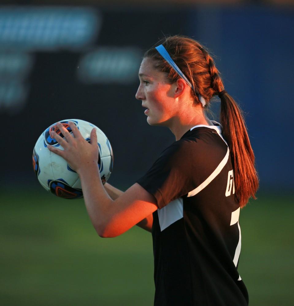 GVL/Kevin Sielaff  
Clare Carlson (7) throws the ball in bounds. The Laker soccer team defeats SVSU Sept. 22 by a margin of 6-1 in Allendale.  