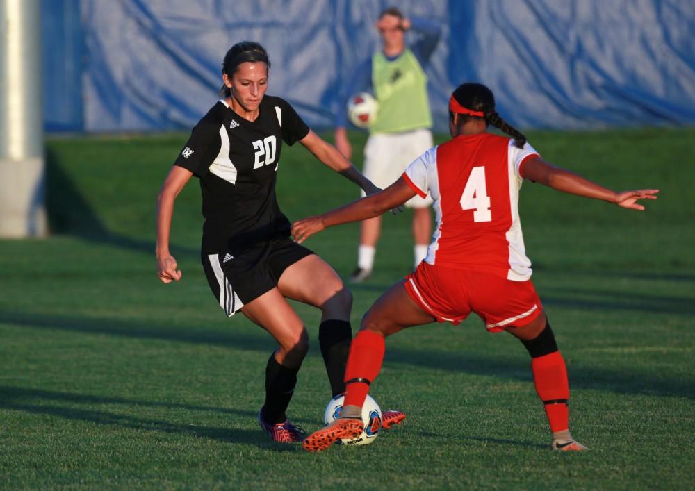 GVL/Kevin Sielaff  
Gabriella Mencotti (20) moves through Bria Spraggins (4) of SVSU. The Laker soccer team defeats SVSU Sept. 22 by a margin of 6-1 in Allendale.  