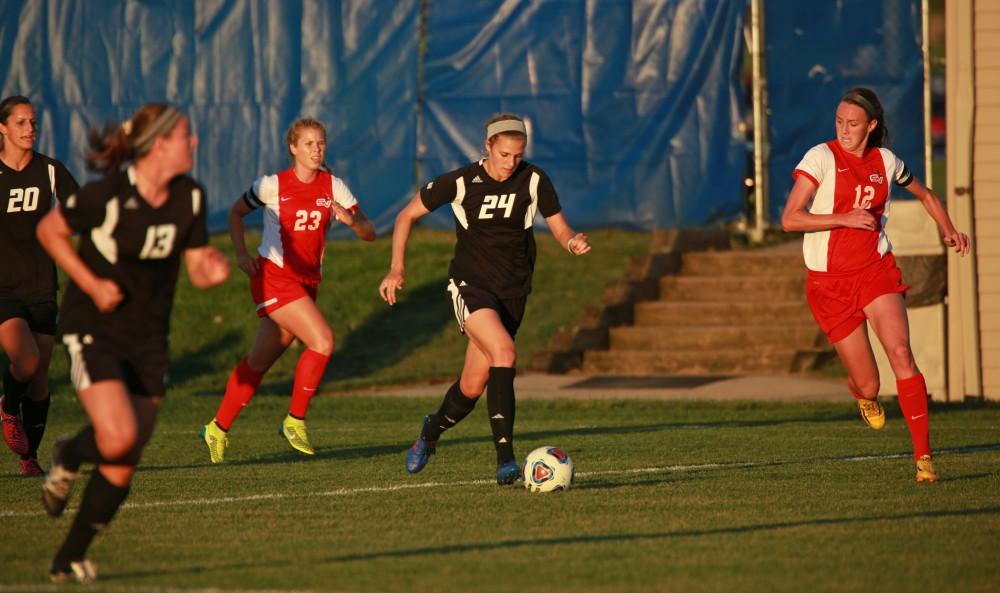 GVL/Kevin Sielaff  
Tracey McCoy (24) pushes the ball up field. The Laker soccer team defeats SVSU Sept. 22 by a margin of 6-1 in Allendale.  