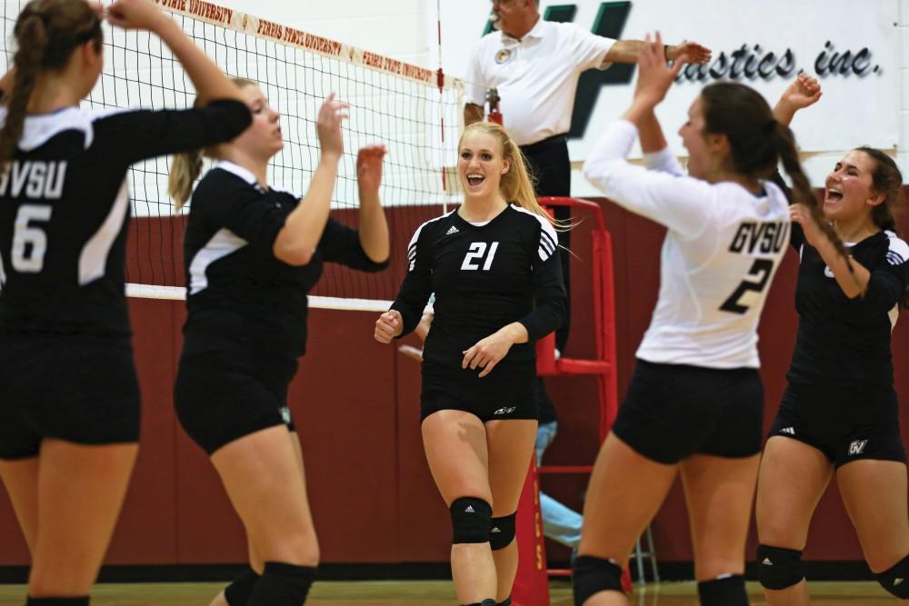 GVL / Kevin Sielaff
Staci Brower (21) celebrates after a point scored. The Lakers fall to the Bulldogs at Ferris State University Sept. 29 by a margin of 3-1.