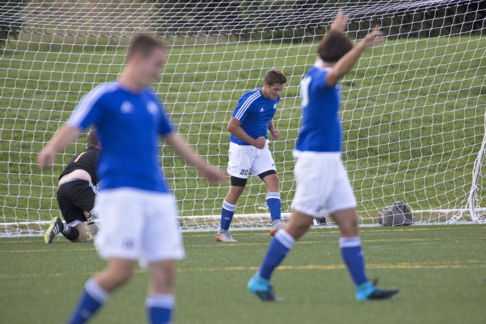 GVL/Kevin Sielaff
Griffon Dean celebrates a goal. Grand Valley's club soccer team squares off against Central Michigan Sept. 12 at the intramural field. 