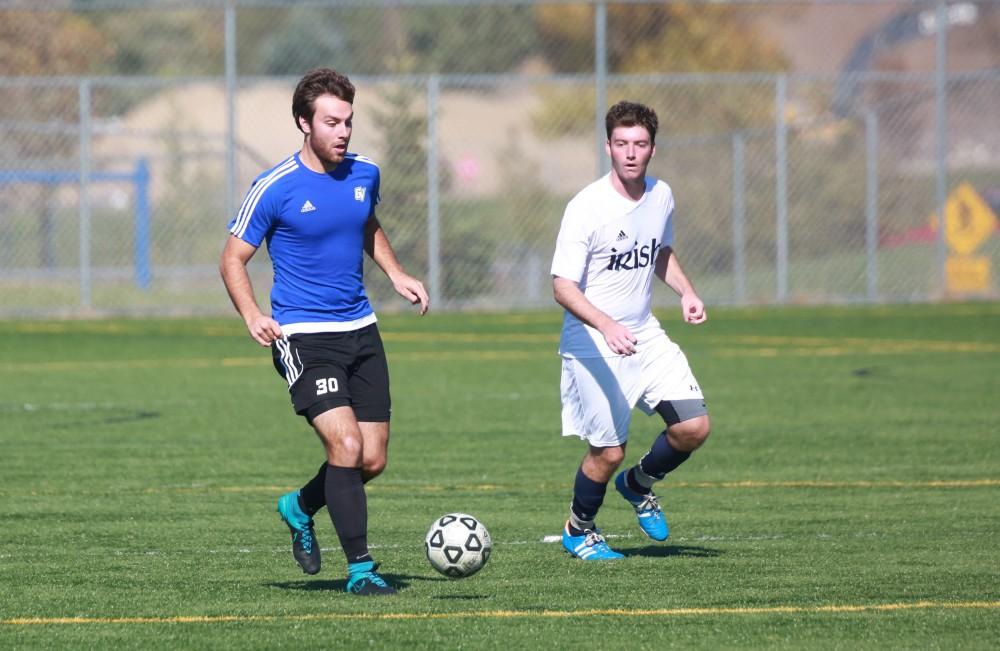 GVL / Kevin Sielaff - Grand Valley's club soccer team sqaures off against Notre Dame University Oct. 11.