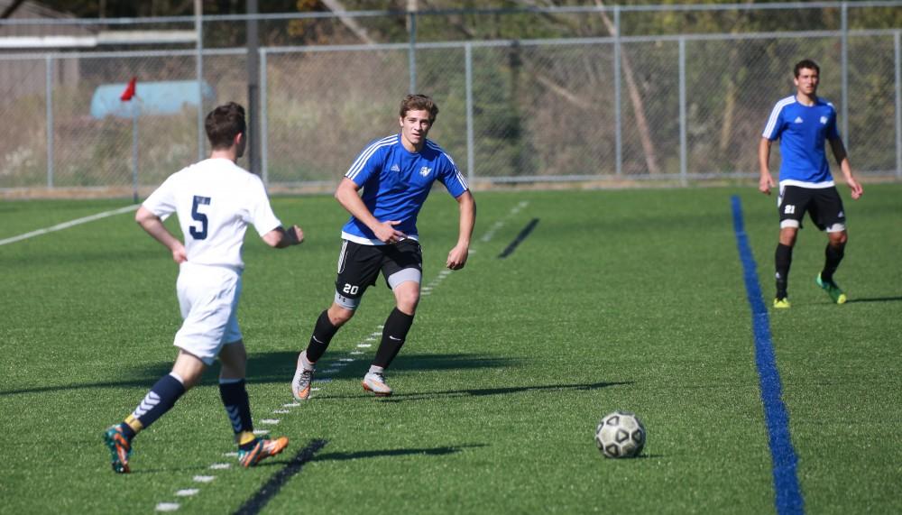 GVL / Kevin Sielaff - Grand Valley's club soccer team sqaures off against Notre Dame University Oct. 11.