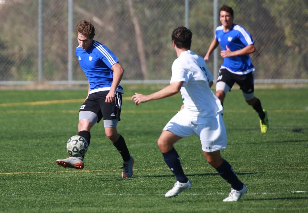 GVL / Kevin Sielaff - Grand Valley's club soccer team sqaures off against Notre Dame University Oct. 11.