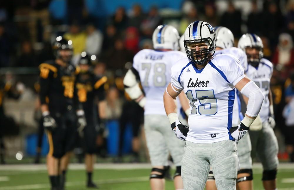 GVL / Kevin Sielaff -  Jamie Potts (15) looks toward the sideline for instructions.  Grand Valley squares off against Michigan Tech Oct. 17 at Lubbers Stadium in Allendale. The Lakers defeated the Huskies with a score of 38-21.