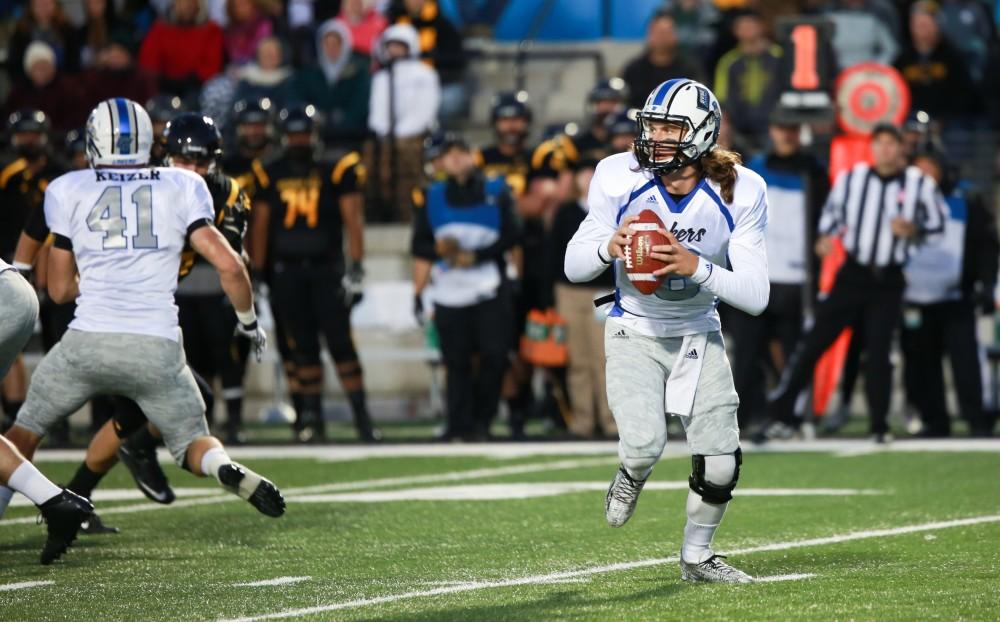 GVL / Kevin Sielaff -  Bart Williams (6) steps back in the pocket. Grand Valley squares off against Michigan Tech Oct. 17 at Lubbers Stadium in Allendale. The Lakers defeated the Huskies with a score of 38-21.