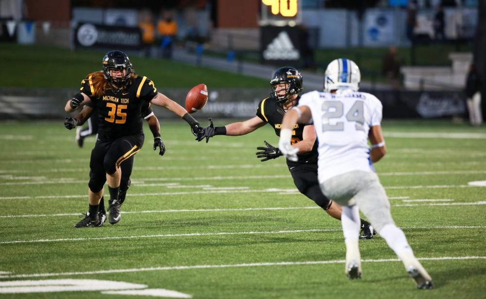 GVL / Kevin Sielaff -  Michigan Tech fumbles an inerception and does not gain posession. Grand Valley squares off against Michigan Tech Oct. 17 at Lubbers Stadium in Allendale. The Lakers defeated the Huskies with a score of 38-21.