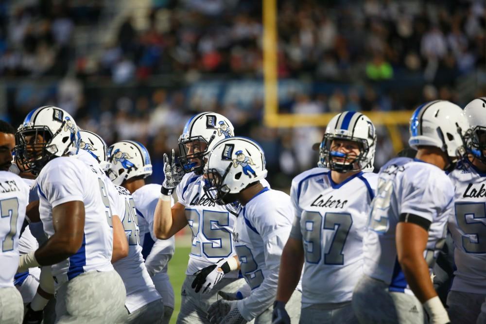 GVL / Kevin Sielaff -  Garrett Pougnet (25) and company take the field. Grand Valley squares off against Michigan Tech Oct. 17 at Lubbers Stadium in Allendale. The Lakers defeated the Huskies with a score of 38-21.