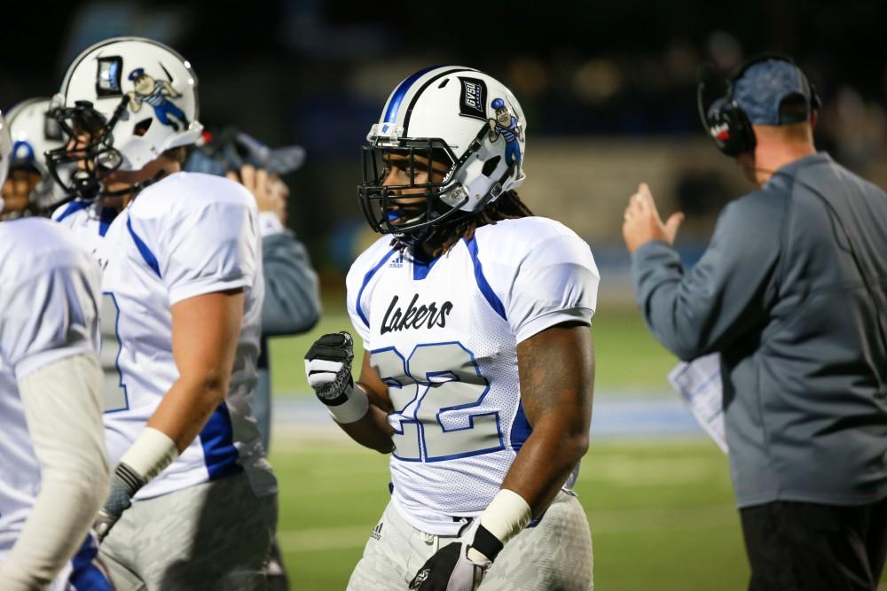 GVL / Kevin Sielaff -  Terrell Dorsey (22) returns to the Grand Valley bench. Grand Valley squares off against Michigan Tech Oct. 17 at Lubbers Stadium in Allendale. The Lakers defeated the Huskies with a score of 38-21.