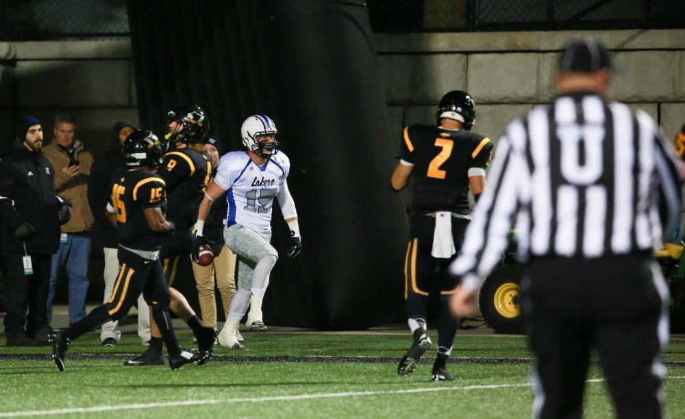 GVL / Kevin Sielaff -  Jamie Potts (15) celebrates a touchdown. Grand Valley squares off against Michigan Tech Oct. 17 at Lubbers Stadium in Allendale. The Lakers defeated the Huskies with a score of 38-21.