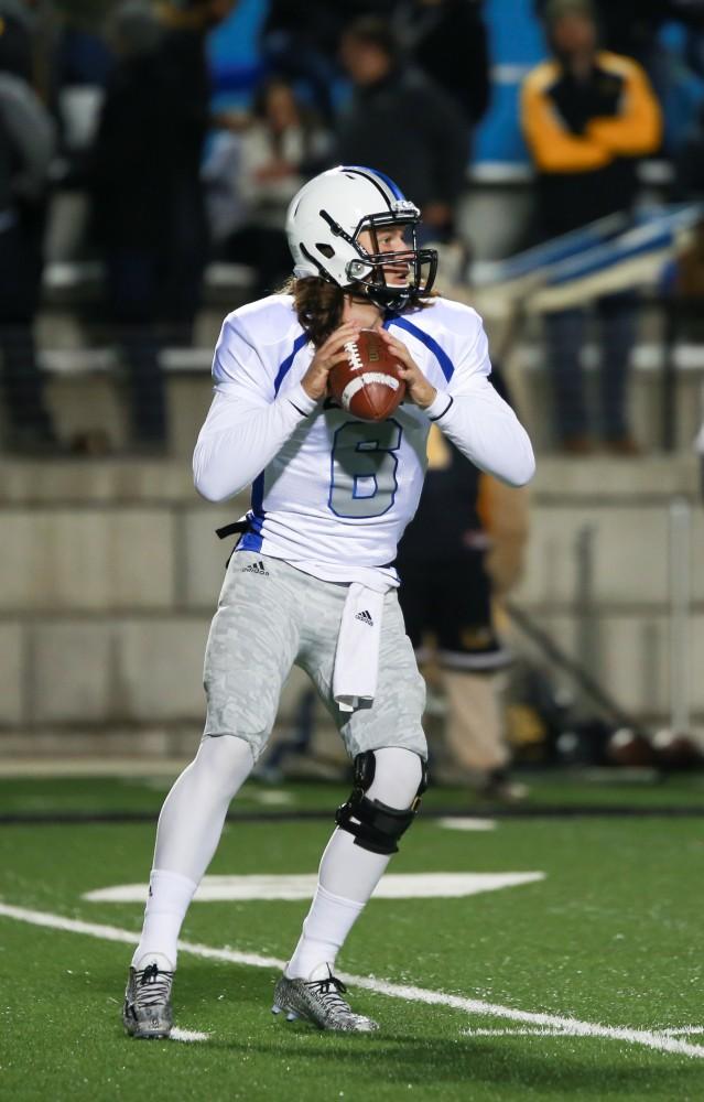 GVL / Kevin Sielaff -  Bart Williams (6) steps back in the pocket and looks for a receiver.  Grand Valley squares off against Michigan Tech Oct. 17 at Lubbers Stadium in Allendale. The Lakers defeated the Huskies with a score of 38-21.