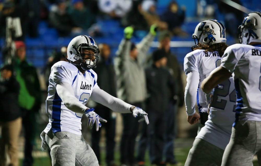 GVL / Kevin Sielaff -  Brandon Bean (3) celebrates after having scored a touchdown.  Grand Valley squares off against Michigan Tech Oct. 17 at Lubbers Stadium in Allendale. The Lakers defeated the Huskies with a score of 38-21.