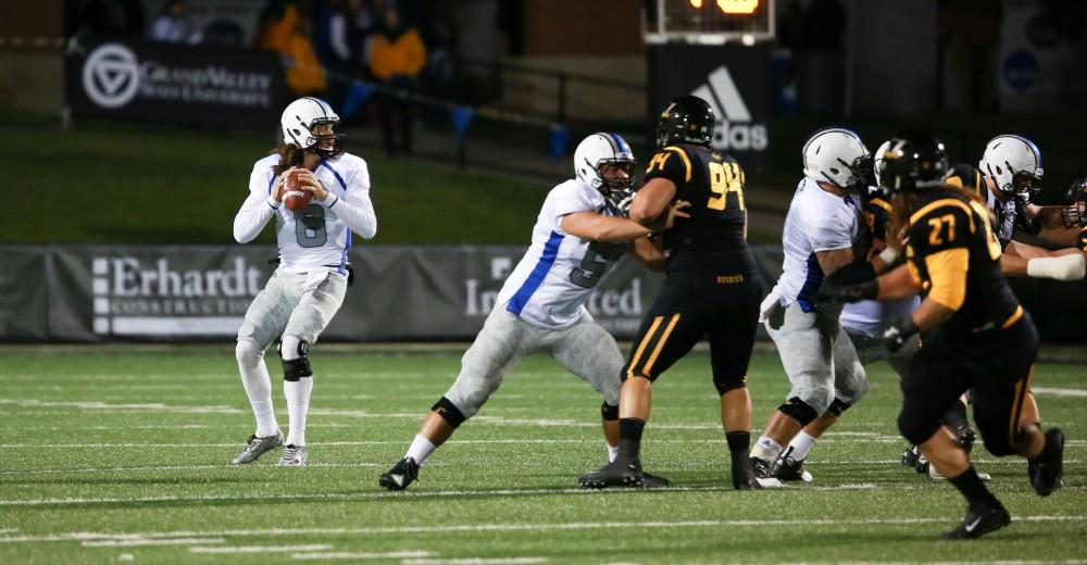 GVL / Kevin Sielaff -  Bart Williams (6) steps back and looks for a receiver.  Grand Valley squares off against Michigan Tech Oct. 17 at Lubbers Stadium in Allendale. The Lakers defeated the Huskies with a score of 38-21.