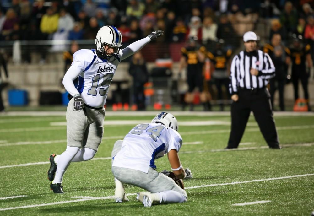 GVL / Kevin Sielaff -  Joes Schipper (19) attempts a field goal. Grand Valley squares off against Michigan Tech Oct. 17 at Lubbers Stadium in Allendale. The Lakers defeated the Huskies with a score of 38-21.