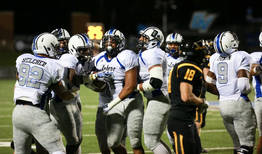 GVL / Kevin Sielaff -  David Talley (7) celebrates after an interception.  Grand Valley squares off against Michigan Tech Oct. 17 at Lubbers Stadium in Allendale. The Lakers defeated the Huskies with a score of 38-21.