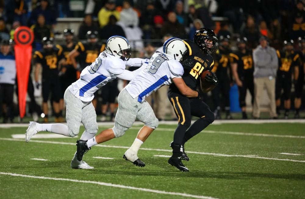 GVL / Kevin Sielaff -  Kyle Short (29) stops the Huskies advance. Grand Valley squares off against Michigan Tech Oct. 17 at Lubbers Stadium in Allendale. The Lakers defeated the Huskies with a score of 38-21.