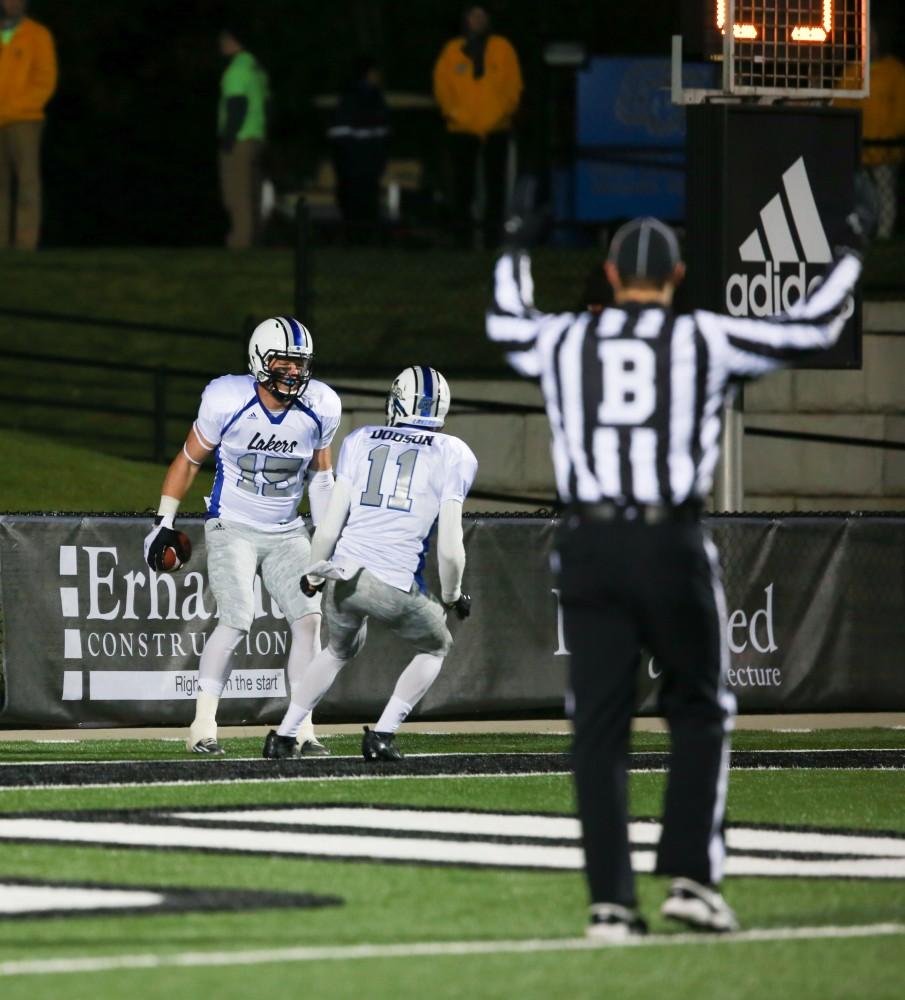 GVL / Kevin Sielaff -  Jamie Potts (15) celebrates after his touchdown.  Grand Valley squares off against Michigan Tech Oct. 17 at Lubbers Stadium in Allendale. The Lakers defeated the Huskies with a score of 38-21.